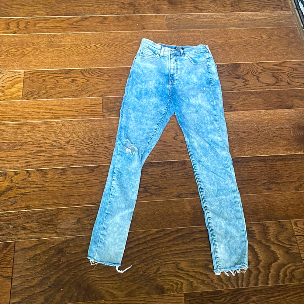 Size OR ripped, distressed, high rise, stretchy waisted jeans, from express.